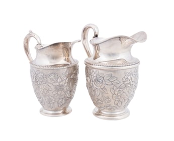 NEAR PAIR OF AMERICAN STERLING WATER PITCHERS