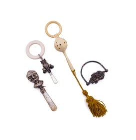 ASST. OF FOUR BABY RATTLES, BONE, MOP & SILVER
