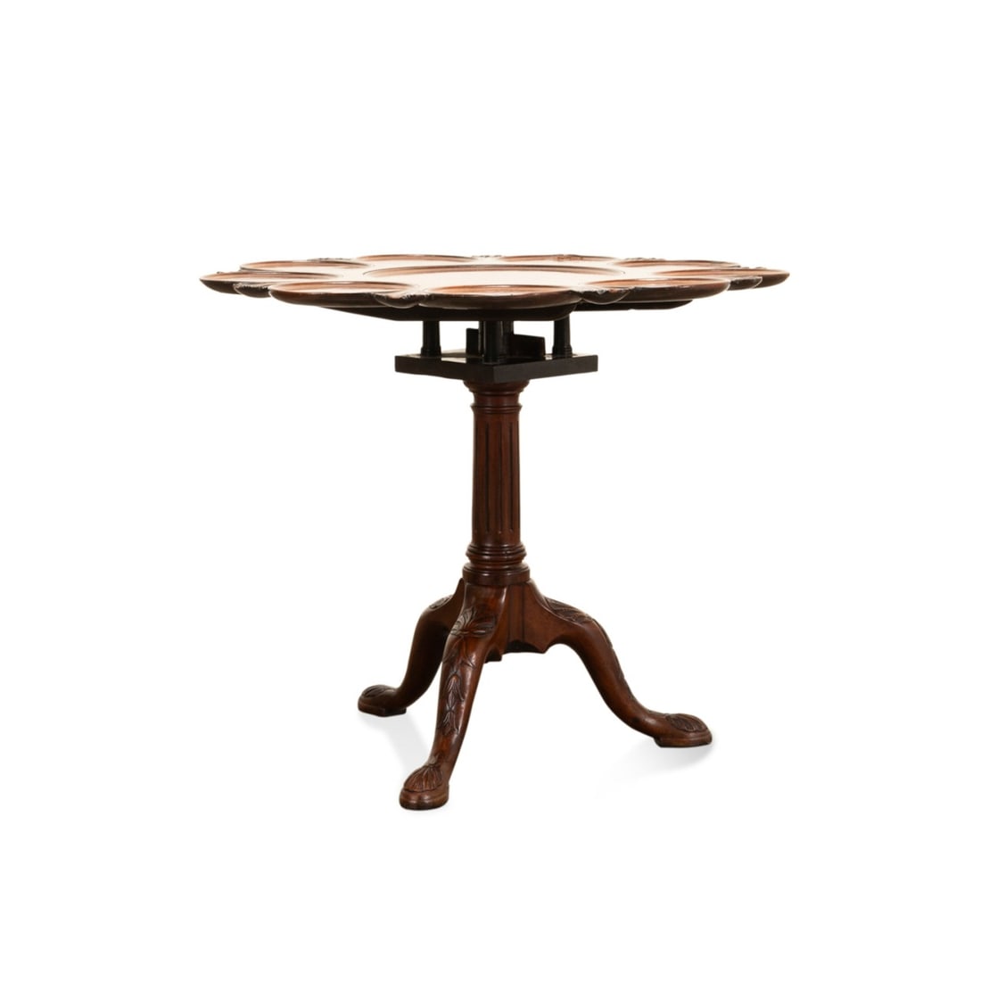 19TH C. CHIPPENDALE STYLE MAHOGANY SUPPER TABLE: English, 19th century. Mahogany pedestal supper table in the Chippendale / Georgian taste, having a center well surrounded by nine smaller wells, birdcage tilt-top mechanism, and rising on cabriole le