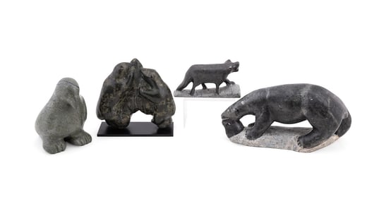 FOUR INUIT STONE CARVINGS