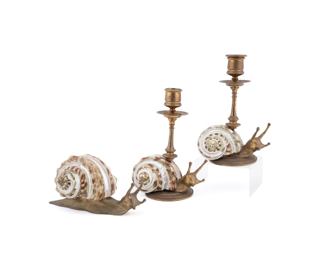 PAIR OF SNAIL MOTIF CANDLESTICKS AND INKWELL: Continental, French or Italian, 20th century. Set of three snail motif brass or bronze desk accessories with natural turbo marmoratus or green turban shells comprising, a pair of single-light candlest