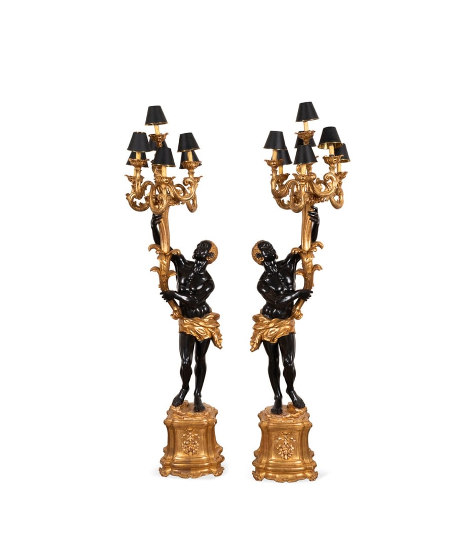 PAIR, 84" TALL ITALIAN BLACKAMOOR TORCHIERES: Italian, 20th century. Pair of two tone blackamoor figures holding a 7-light torchiere issuing from a cornucopia, with gilt base, apparently unmarked. Approximate dimensions: h. 84", w. 23", d. 20".