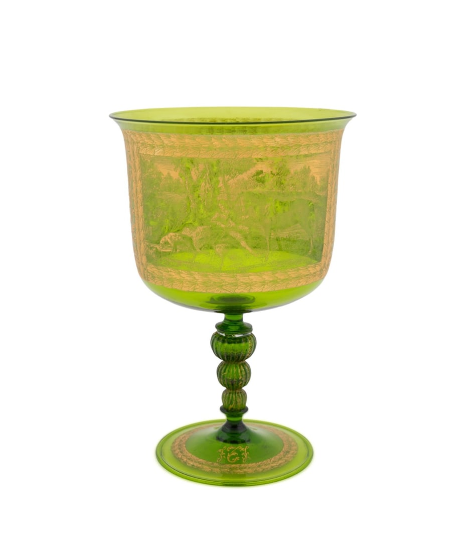 VENETIAN GILDED GLASS CHALICE AFTER THE HUNT SCENE: Italian. Venetian glass chalice, having hand-painted and etched gilding on green glass, depicting Francesco Zuccarelli's "After the Hunt", inscribed to back "F. Zuccarelli / DOPO LA CACCIA" and illegi