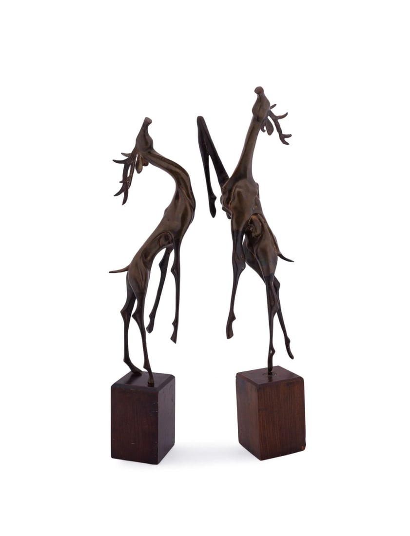 PAIR OF MODERN BRUTALIST BRASS DEER SCULPTURES: Possibly American, 20th century. Pair of Modern Brutalist brass sculptures, each modeled as a leaping deer, on wooden bases, apparently unmarked. Provenance: Private Collection of Scott Smith, Mariett