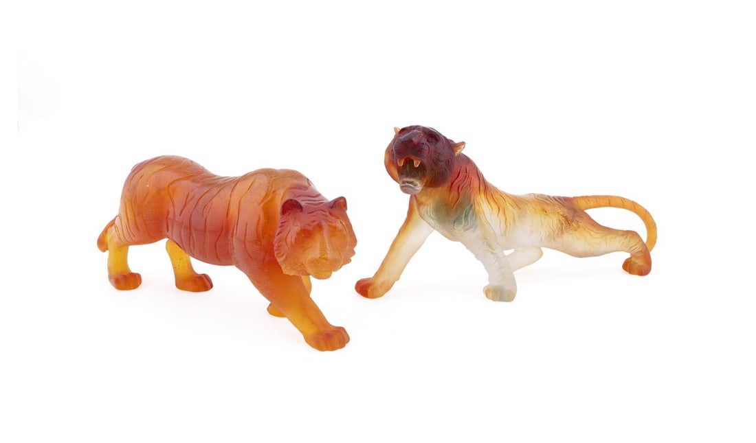 DAUM, TWO SIGNED AMBER TIGER FIGURES: Daum (French, founded 1878). Two tiger figures comprising a "Bengal" roaring tiger frosted amber and an Animal Universe series stalking clear amber tiger, roaring tiger acid-etched signature "Daum Fra