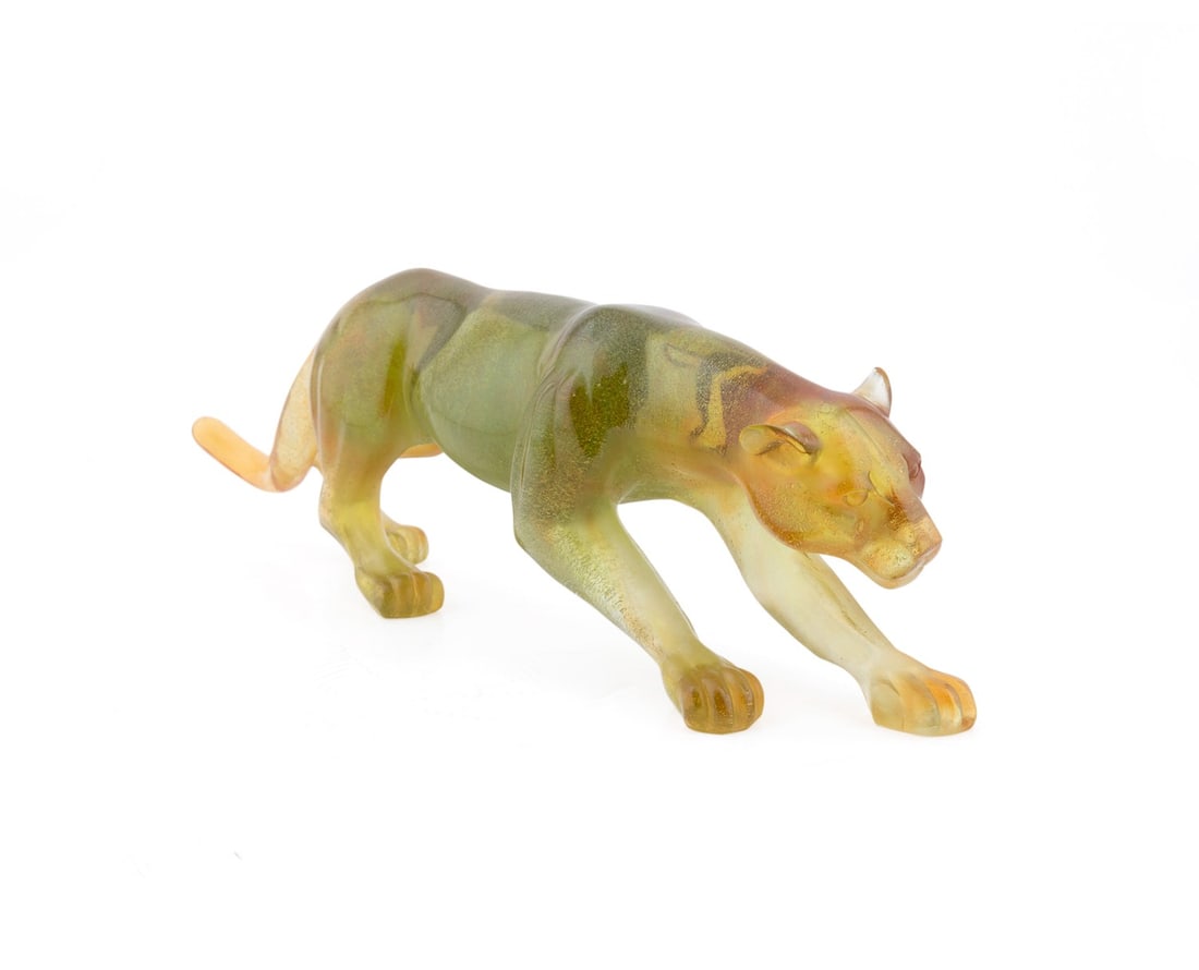 DAUM, GREEN AND AMBER NUMBERED 'PANTHERE' FIGURE: Daum (French, founded 1878). Limited edition green and amber pate de verre crystal "Panthere" or panther, acid-etched marked "Daum" to outside of back left hind foot, numbered "003/125" to outside of