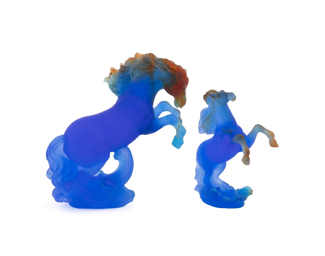 DAUM, TWO BLUE AND AMBER REARING HORSE FIGURES: Daum (French, founded 1878). Two blue and amber Marly collection rearing horses, both are acid-etched "Daum France" to the underside of base. Provenance: Private Collection of an Esteemed Gentleman, A