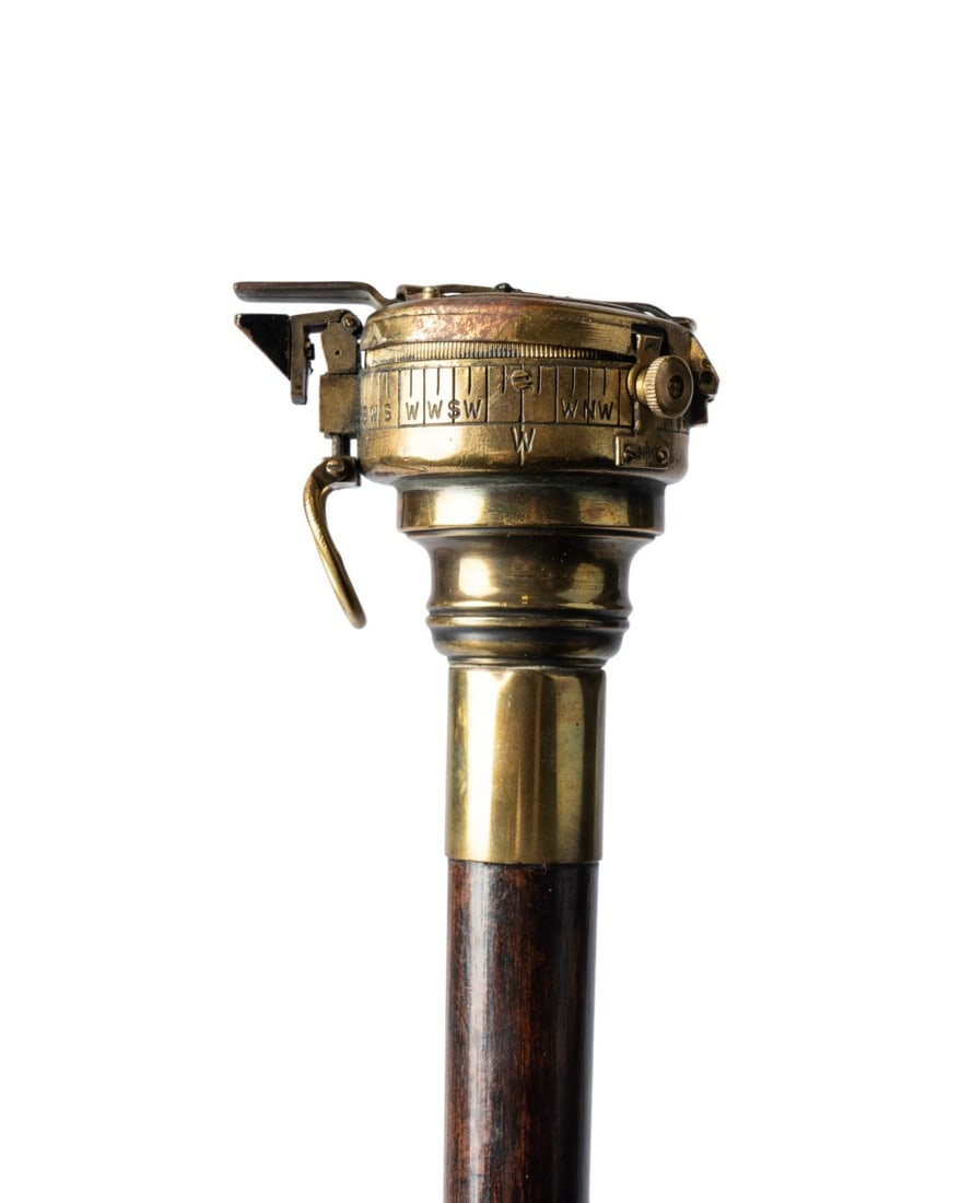 WORLD WAR I SEA OFFICER COMPASS CANE, C. 1915: Continental, circa 1915. World War I sea officer?s walking cane with floating compass in solid brass container, glass-protected lid secured by two brass strips with three screws, finely turned