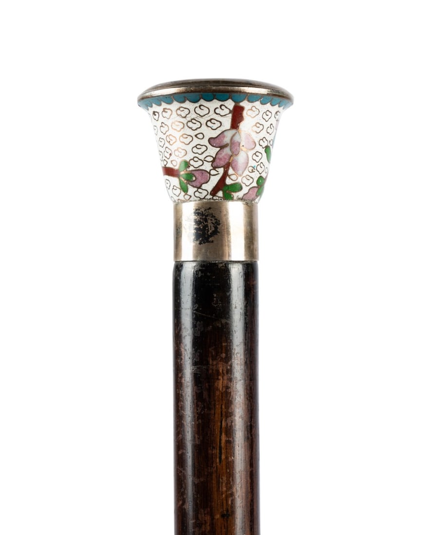 RUSSIAN ENAMEL WALKING CANE WITH SEAL IN HANDLE: Russian, circa 1910. Walking cane with an enameled handle, silver collar, engraved metal top, stained hardwood shaft, brass ferrule, and a hidden cloisonne seal revealed when unscrewed. Approximate
