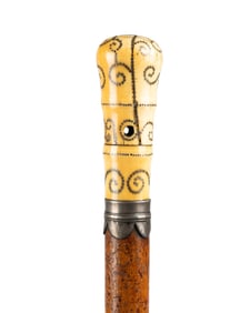 FRENCH CARVED PIQUE CANE, C. 1680