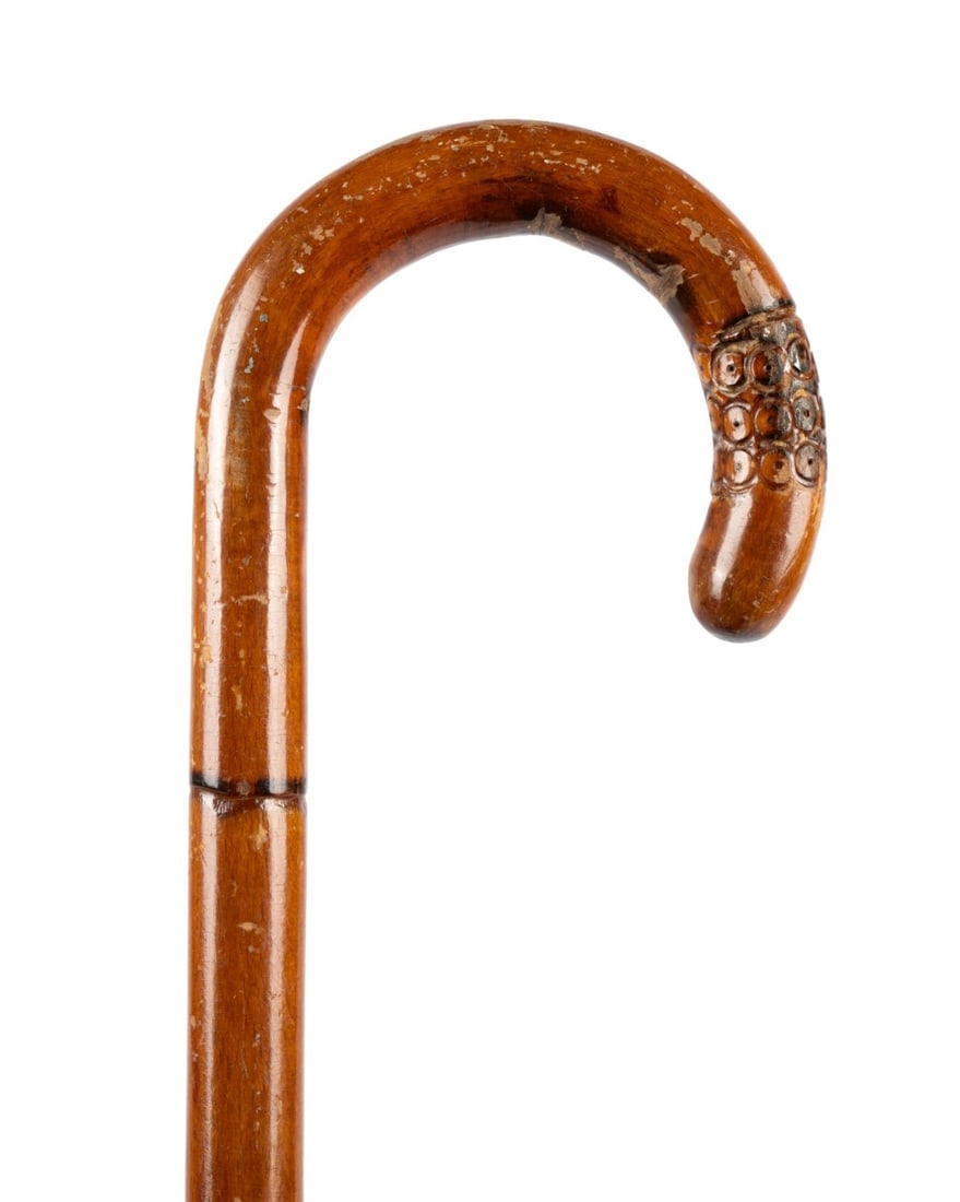 CHINESE CROOK HANDLE BAMBOO CANE, C. 1900: Chinese, circa 1900. Walking cane with carved bamboo crook handle with decorative end, bamboo shaft, and metal ferrule. Approximate measurements: length: 35"