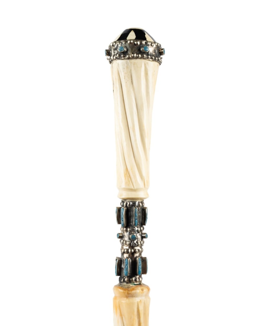 19TH C. MIDDLE EASTERN BONE SWORD CANE: Middle Eastern, circa 1890. Walking cane with carved bone handle with silver bands and inset turquoise, alternating sections of carved bone, silver, and turquoise, hardwood lower shaft, no ferrule, an