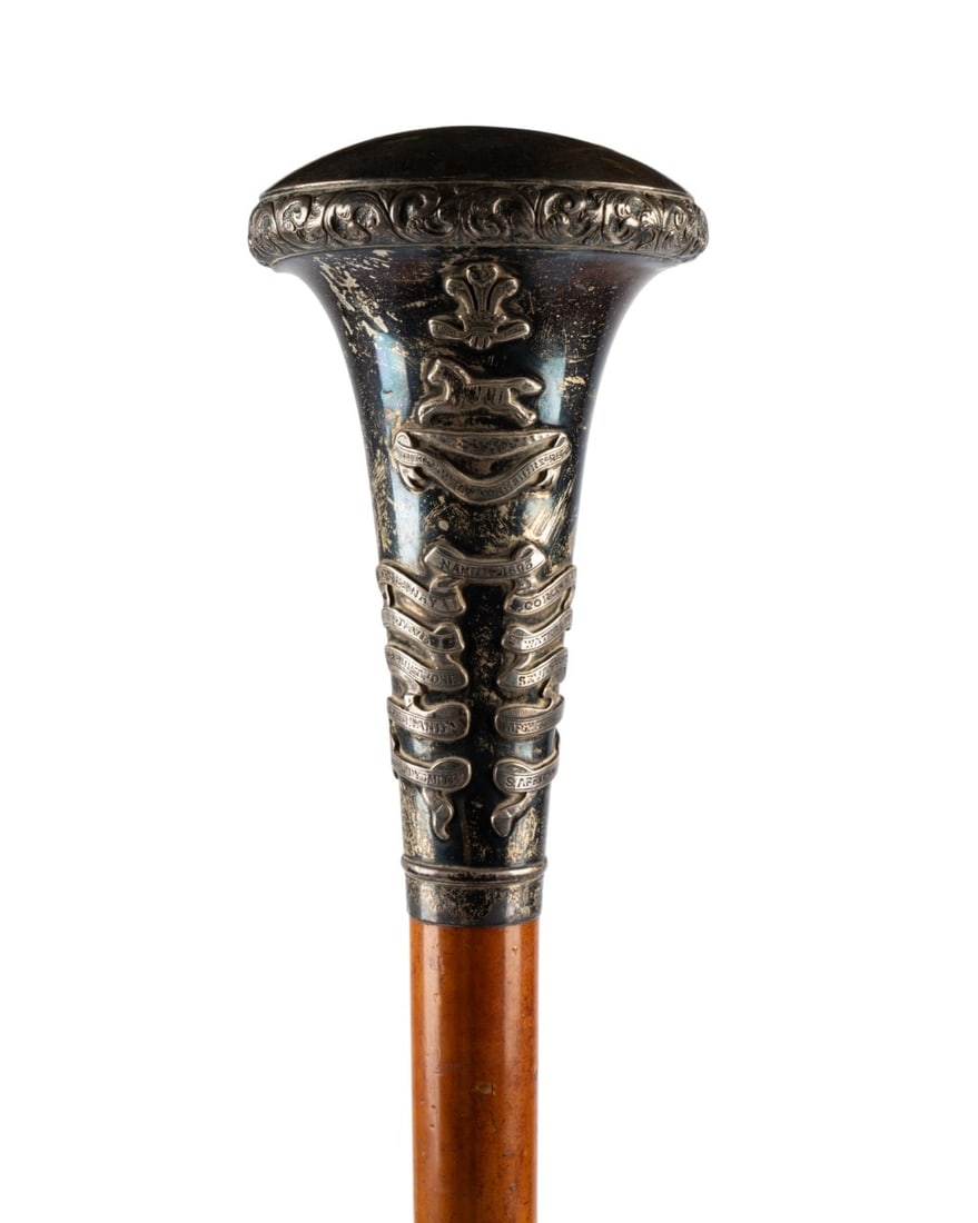 ENGLISH WORLD WAR I REGIMENTAL STAFF CANE, 1917: English, 1917. Regimental staff cane with large silver handle embossed with 11th Battalion West Yorkshire Regiment crest and battle honors 1695-1902, top engraved ?"Hill 60, 3:10 AM, 7.6.17", Malacca