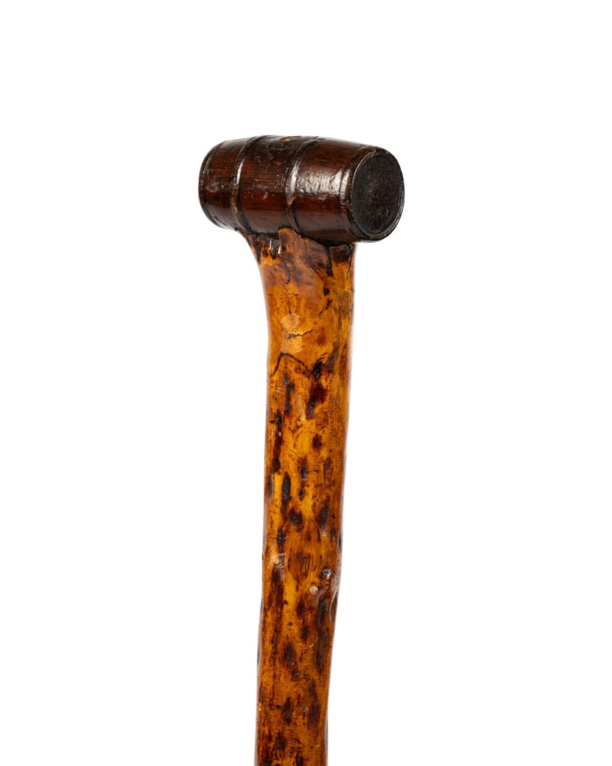 19TH C. AMERICAN HARD CIDER BARREL CANE: American, circa 1840. Walking cane with dark wood handle surmounted by walnut cider barrel associated with William Henry Harrison's 1840 campaign, with natural hickory shaft, and long 5" brass and