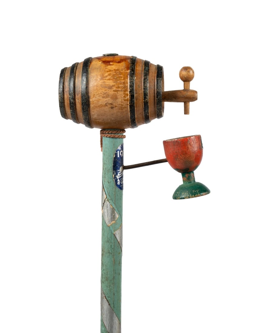 AMERICAN END OF PROHIBITION WALKING CANE, 1933: American, 1933. Walking cane made for the Chicago Century of Progress World's Fair with barrel and cup handle, partially peeled decal reading "933", round wooden shaft, and metal ferrule. Approximate