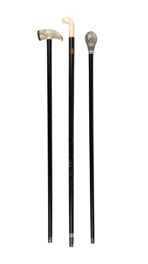 THREE CARVED HANDLE WALKING CANES (1 of 10)