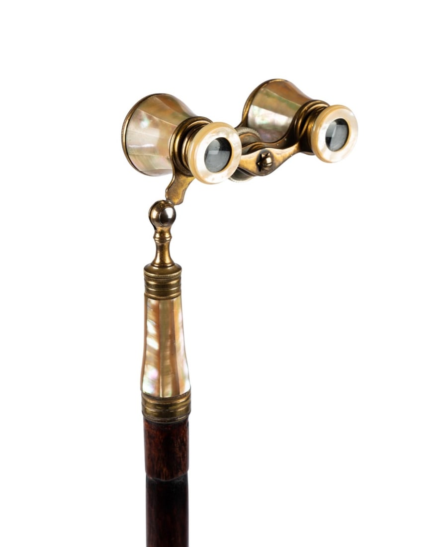 19TH C. FRENCH DERAISME THEATER BINOCULARS CANE: French, circa 1890. Gadget walking cane with brass and mother of pearl theater binoculars by Deraisme, brass collar connecting to darkly stained hardwood shaft with repeating notches, terminating in p