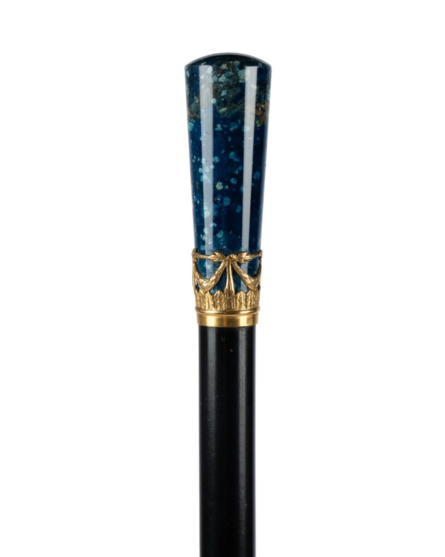 19TH C. LAPIS LAZULI & ROSEWOOD WALKING CANE: Continental, circa 1890. Walking cane with polished lapis lazuli handle and decorative rolled gold collar, with ebonized rosewood shaft terminating in horn ferrule. Approximate measurements: handle: 2