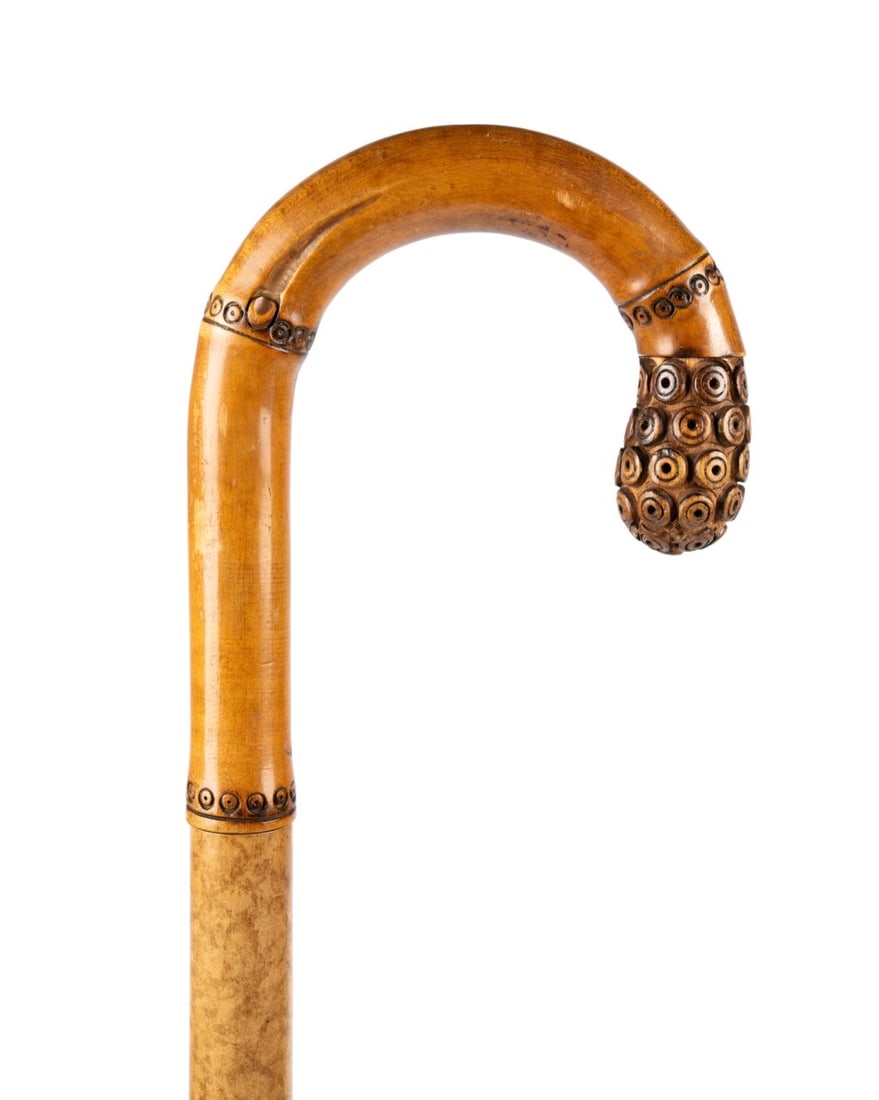 GERMAN BAMBOO UMBRELLA GADGET CANE, C. 1900: German, circa 1900. Umbrella cane with carved crook handle, segmented bamboo shaft hollowed to house a black silk umbrella, with brass ferrule. Approximate measurements: length: 36.25"