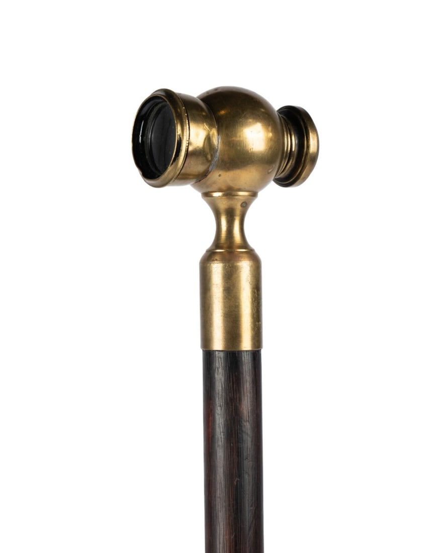 FRENCH TELESCOPE HANDLE CANE, 19TH CENTURY: French, 19th century. Walking cane with brass handle incorporating built-in telescope embossed "IRIS-Paris" on eyepiece, mounted on brass descending pedestal, with hardwood shaft terminating in metal