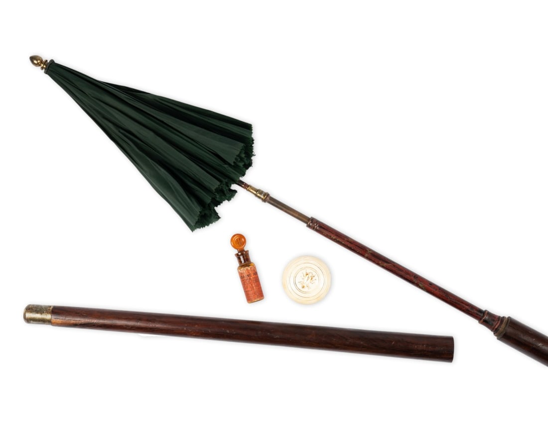 FRENCH ENTOMOLOGIST'S GADGET CANE, C. 1880: French, circa 1880. Entomologist’s gadget walking cane with carved bone handle topped with insect, unscrewing to reveal silk insect net, hardwood shaft unscrewing at midpoint to reveal telescoping