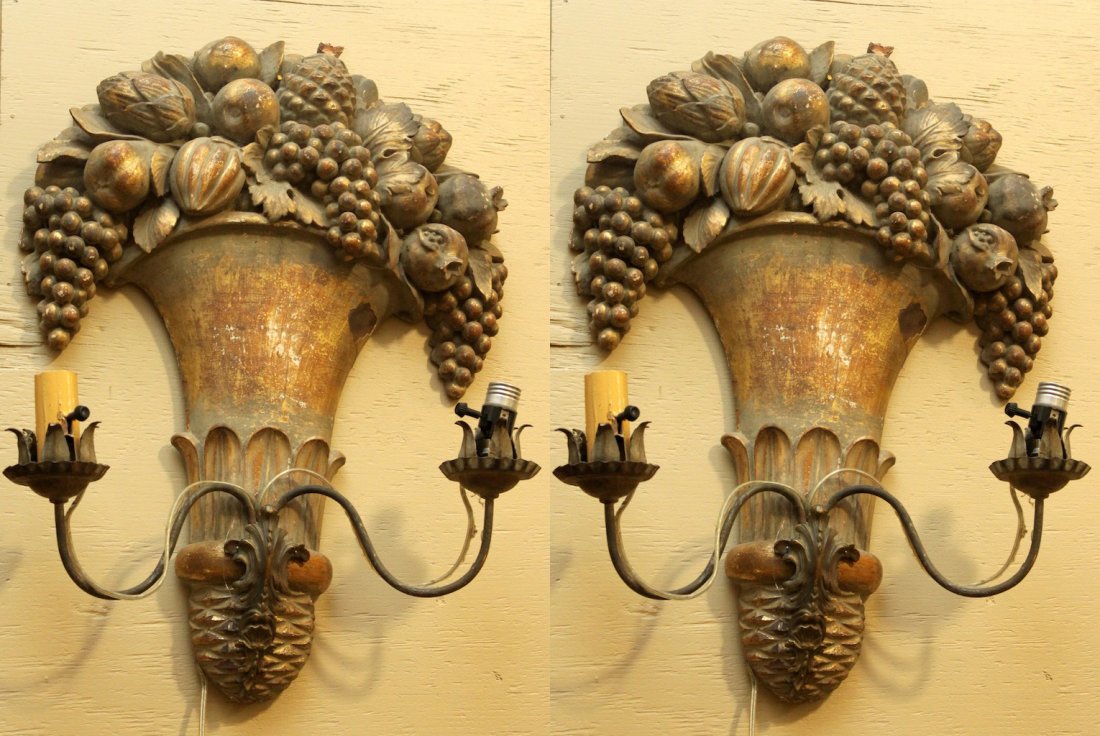 Pair of Gilt Wood Sconces: Fruit Decoration. Measures 23" tall and 17" across.