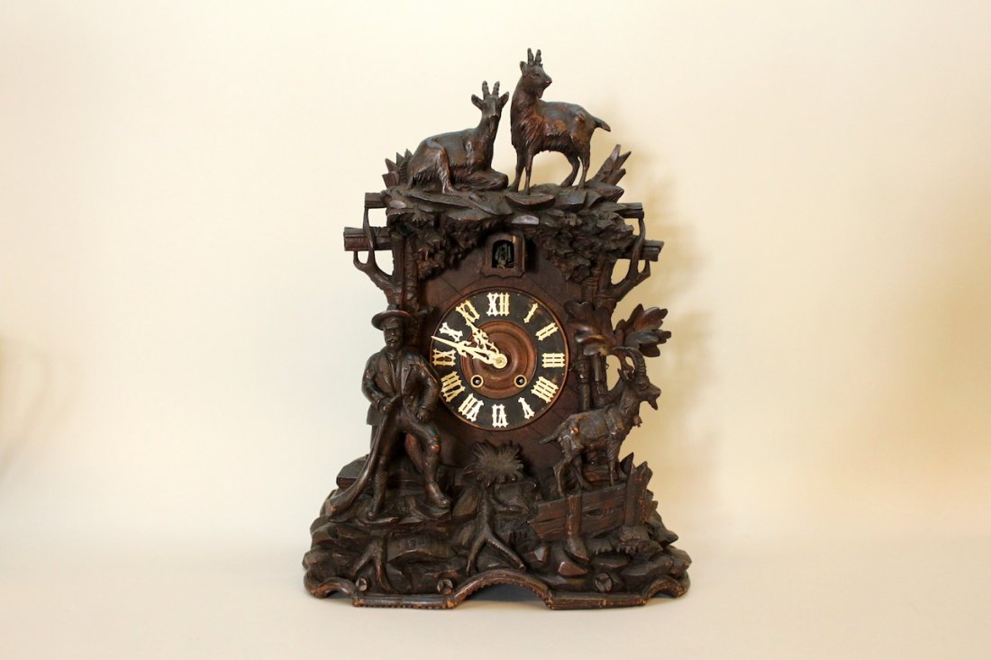 Large Fine 19th Century Black Forest Cuckoo Clock: A beautiful fully functioning example of a large 19th century Black Forest Cuckoo Clock. Measures 25" tall and 17 1/2" wide.