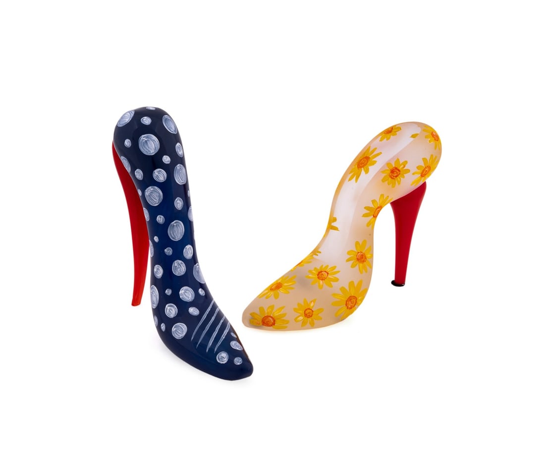 KJELL ENGMAN FOR KOSTA BODA, TWO GLASS SHOES: Kjell Engman (Swedish, born 1946) for Kosta Boda (Swedish, founded 1742), late 20th to early 21st century. Group of two painted glass stiletto "Shoes" comprising, an Unique series shoe decorated with