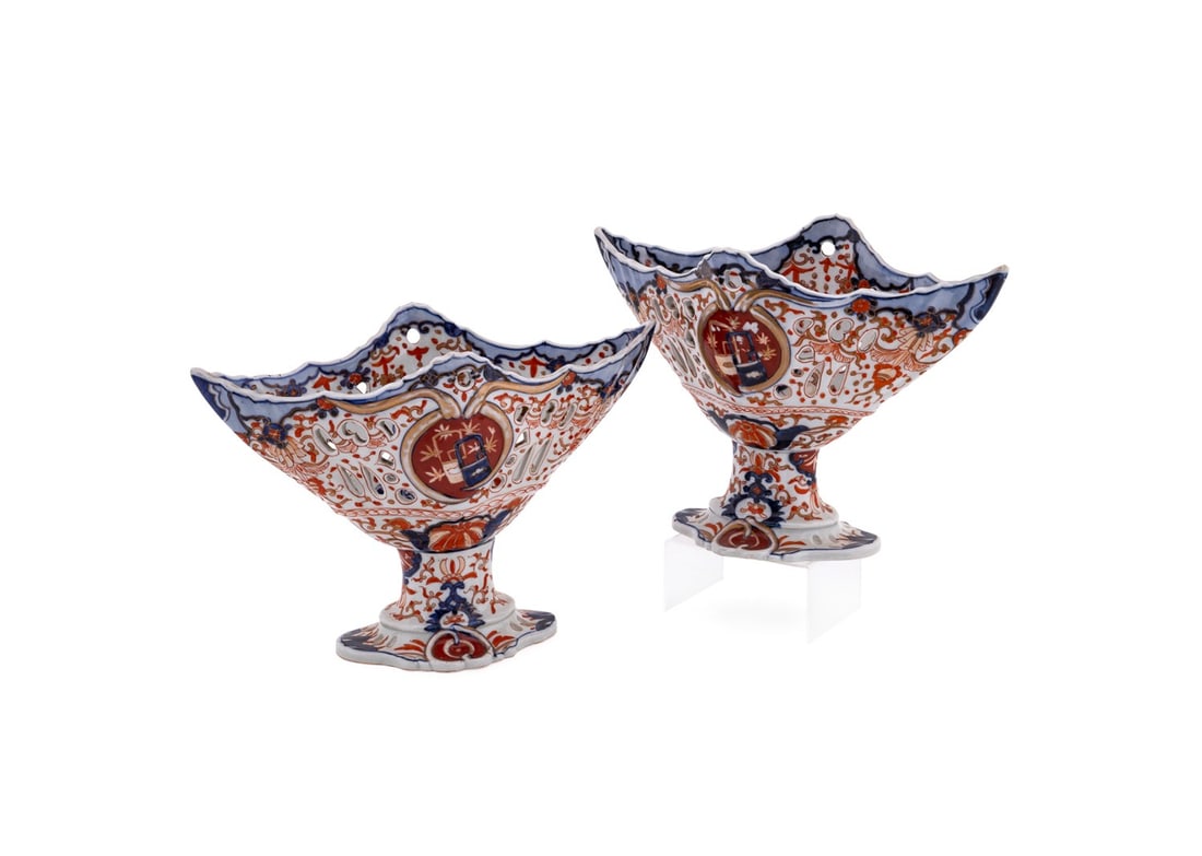 PAIR, JAPANESE IMARI BOAT SHAPED FRUIT COMPOTES: Japanese, early 20th century. Pair of Imari boat shaped footed fruit compotes in the traditional Imari palette of iron red, cobalt blue and gilt on white, apparently unmarked. Provenance: Estate of Sc