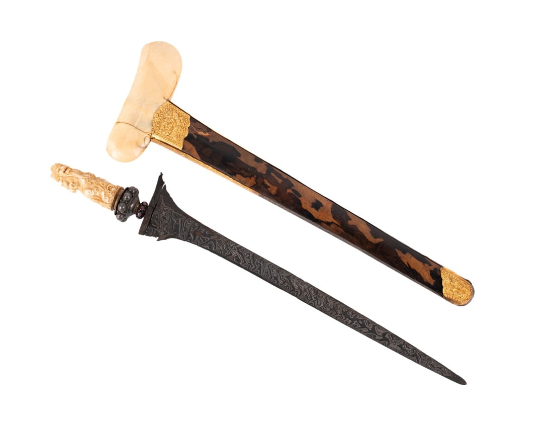 BALINESE KRIS, CARVED BONE DEITY, GOLD REPOUSSE: Southeast Asian. Balinese Kris / Keris having an intricately carved anthropomorphic deity bone hilt, carved bone wrangka, and gold repousse wrapped scabbard, apparently unmarked. Note: Ahlers & Ogletr