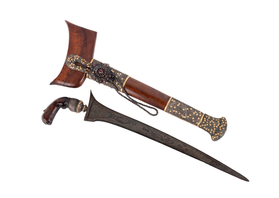 INDONESIAN JAVANESE KRIS CARVED WOOD/GILDED SILVER: Southeast Asian, 20th century. Indonesian Javanese Kris / Keris having carved wood and silver gilt mounted, mendak, selut, and scabbard, and accented with semi-precious stone cabochons, apparently unm