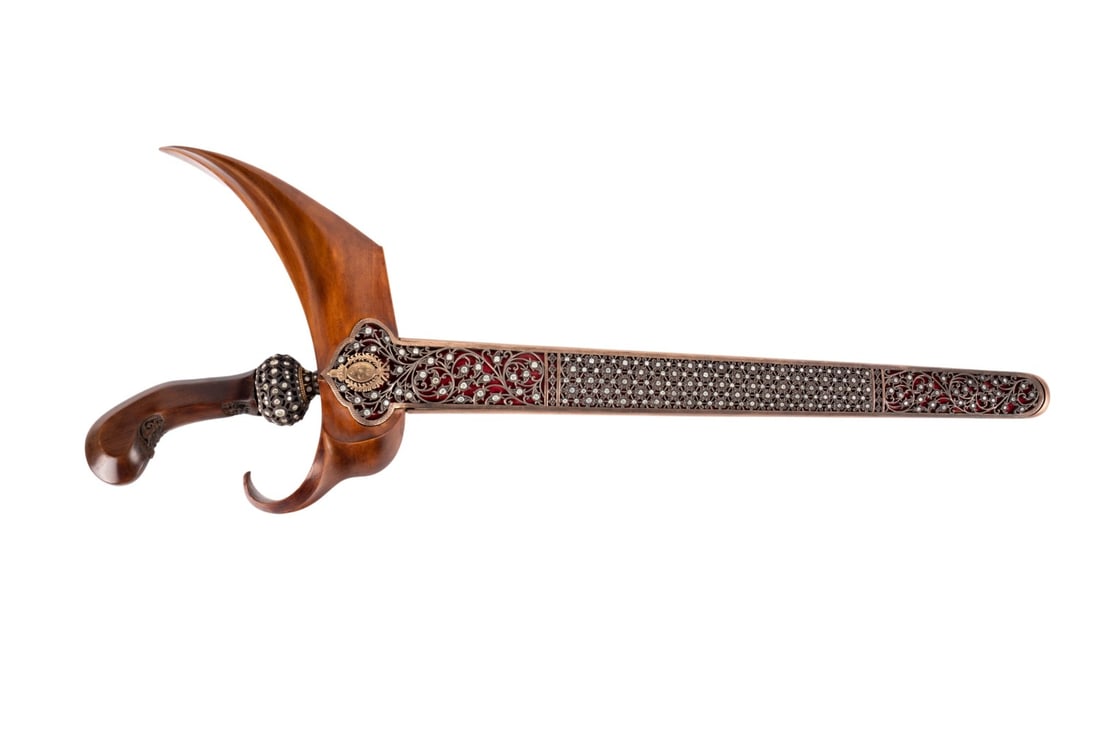 JAVANESE PRESENTATION KRIS, DIAMOND AND WOOD: Southeast Asian. Indonesian Javanese presentation Kris / Keris, having a diamond encrusted selut, mendak and sheath, carved wooden hilt and wrangka, and royal Surakarta coat of arms engraved back of