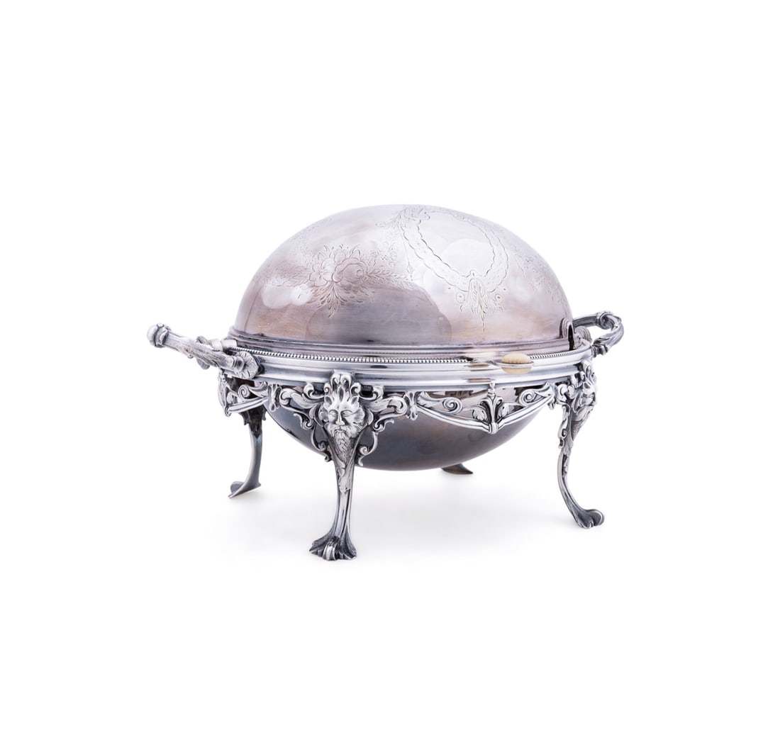 VICTORIAN SILVERPLATE REVOLVING DOME SERVER: John Round & Son Ltd. (British,1874-1962), late 19th to early 20th century. Victorian or Edwardian era silverplate domed breakfast server, having a floral patterned revolving lid, pierced warming tray