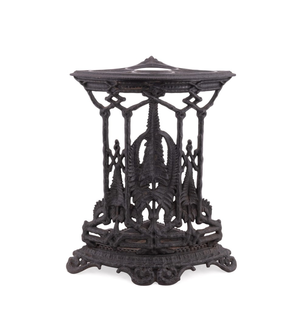 ATTRIB. COALBROOKDALE IRON 'FERN' UMBRELLA STAND: Attributed Coalbrookdale Foundry (English 1709-2017), circa 1860. Victorian era cast iron "Fern" corner umbrella or walking stick stand, having a removable drip pan, maker's and British registry marks