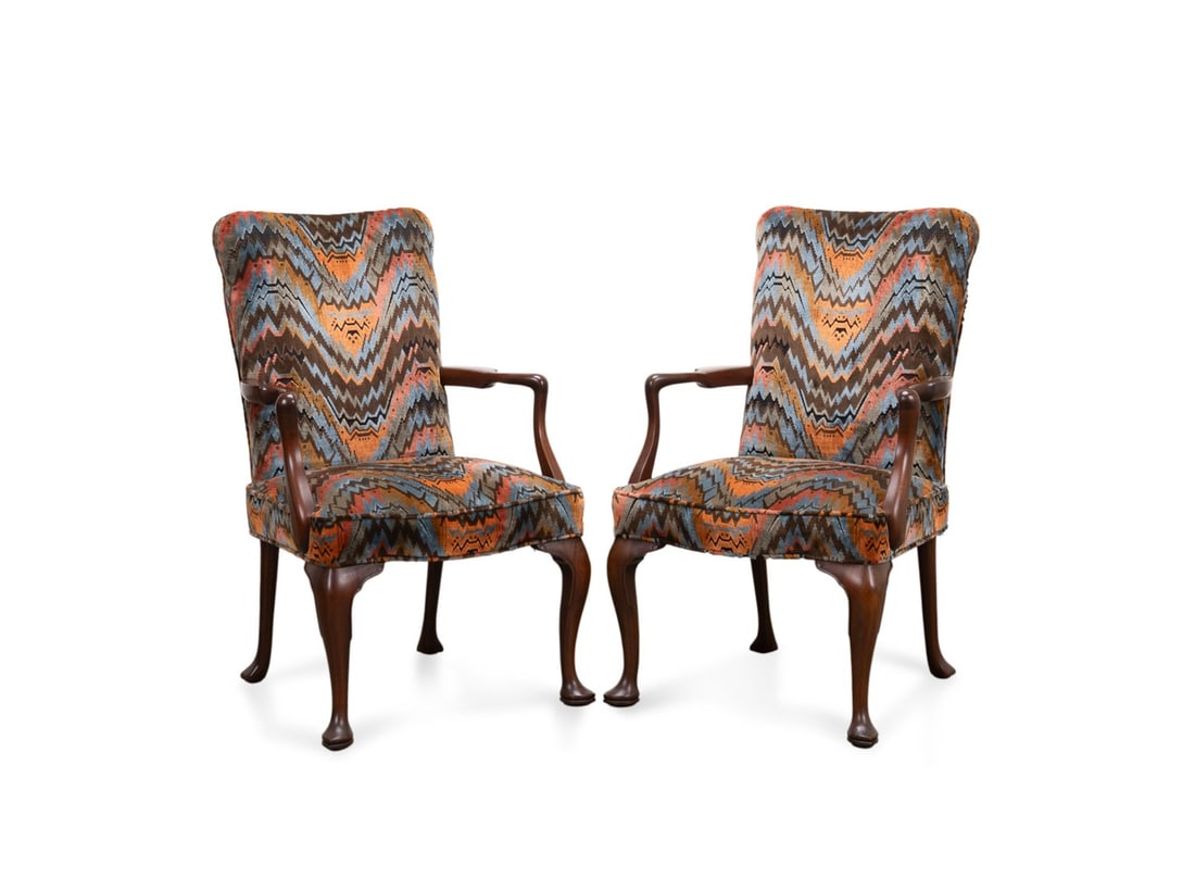 PAIR, KITTINGER QUEEN ANNE UPHOLSTERED ARM CHAIRS: Kittinger Company Inc. (American, founded 1866), circa 1970. Pair of Queen Anne style mahogany arm chairs, having velvet flame stitch upholstery, appropriately marked to underside, dealers paper tag t