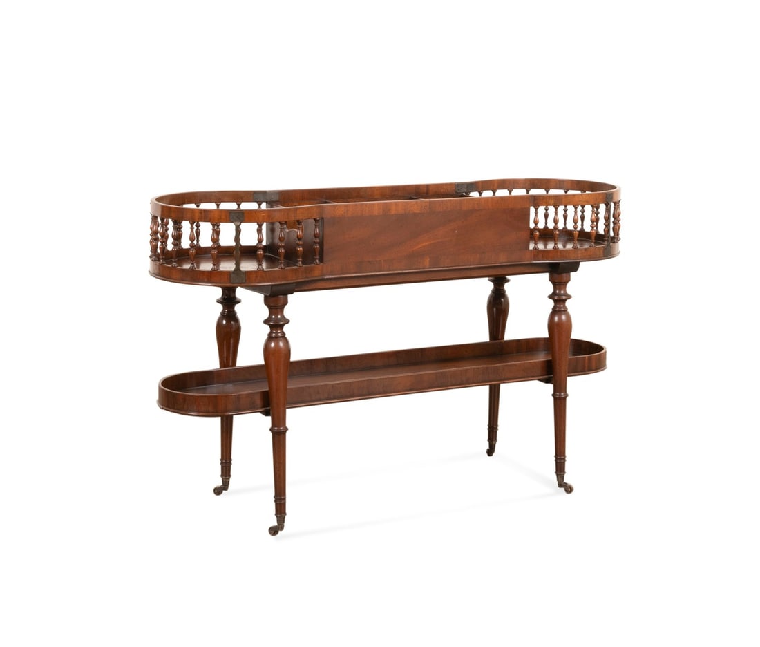 BAKER FURNITURE GEORGIAN STYLE DOUBLE PLATE STAND: Baker (American, founded 1890). Georgian style mahogany 2-tier double plate and cutlery stand, having rounded baluster lined ends and raised on turned legs with casters, appropriately marked with bras
