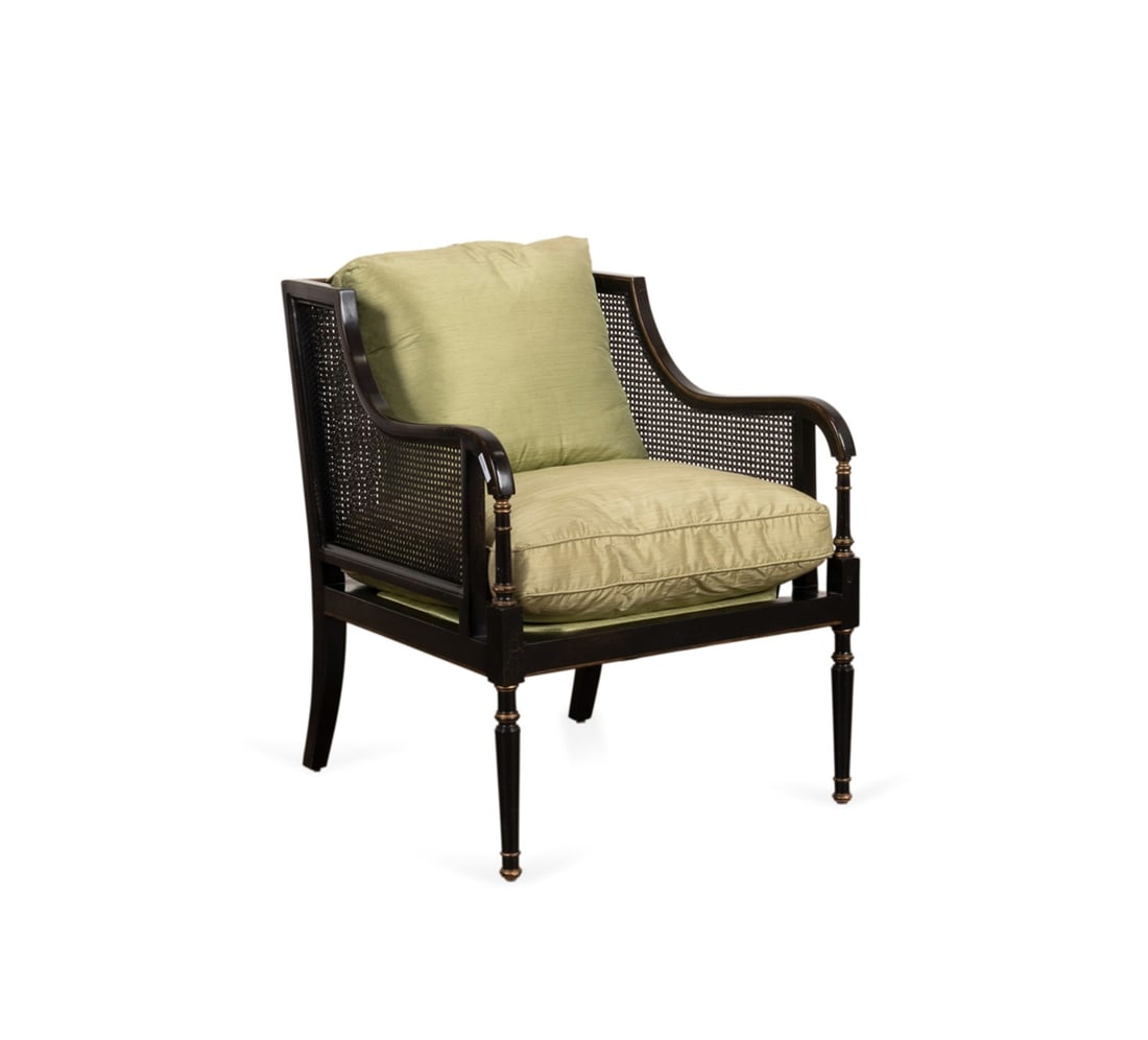 MINTON-SPIDELL 'BRIGHTON' EBONIZED & CANE ARMCHAIR: Minton-Spidell (American (California), founded circa 1969). "Brighton" Regency style "Black Kutani" and gilt finish armchair, having caned sides and loose silk upholstered cushions, apparently unmarke