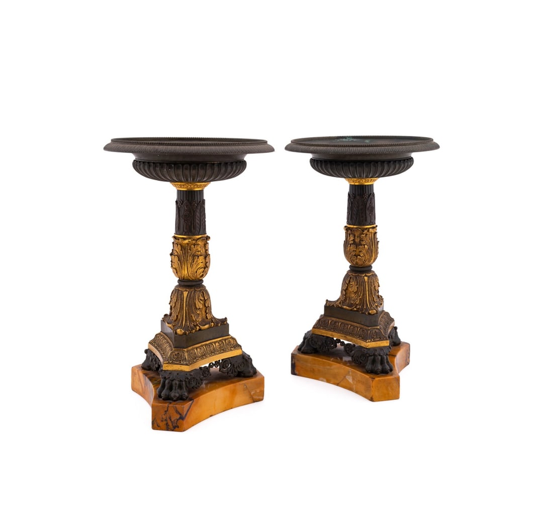 PAIR OF CHARLES X BRONZE & SIENNA MARBLE COMPOTES: French, 19th century. Pair of Charles X patinated and gilt bronze tazzas or compotes each having a gadrooned bowl, baluster-form acanthus stem, and rising on paw feet with concave Sienna marble plinth
