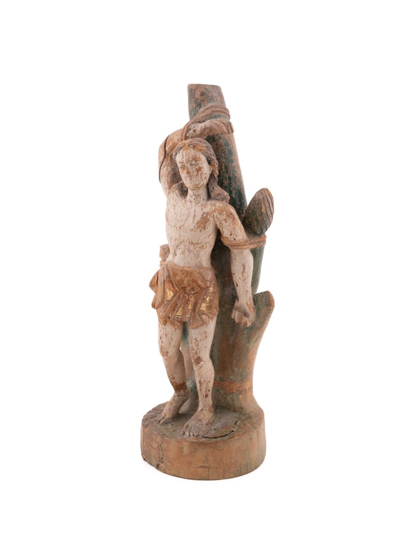 SPANISH COLONIAL CARVED FIGURE OF ST. SEBASTIAN: Likely Mexican, Central or South American, or Continental, 19th / 20th century or earlier. Spanish Colonial carved polychrome decorated wooden figure depicting the martyrdom of Saint Sebastian,