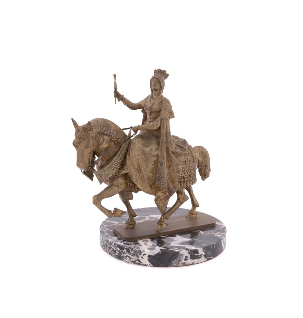 QUEEN ISABELLA I, BRONZE EQUESTRIAN SCULPTURE: Manner of Manuel Oms (Spanish, 1842-1889); Continental, first half 20th century. Gold finished bronze equestrian figure depicting Queen Isabella I (Spanish, 1451-1504), Queen of Castile, based in part