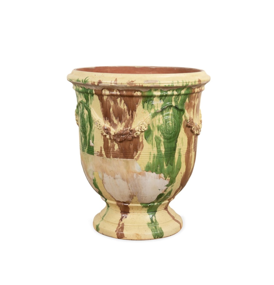 LARGE POTERIE LE CHENE VERT GLAZED GARDEN PLANTER: Poterie Le Chene Vert (French), 20th century. Large Anduze yellow, green, and brown glazed terracotta garden planter, decorated with swags and heraldic shields, stamped marks to the interior. Approxim