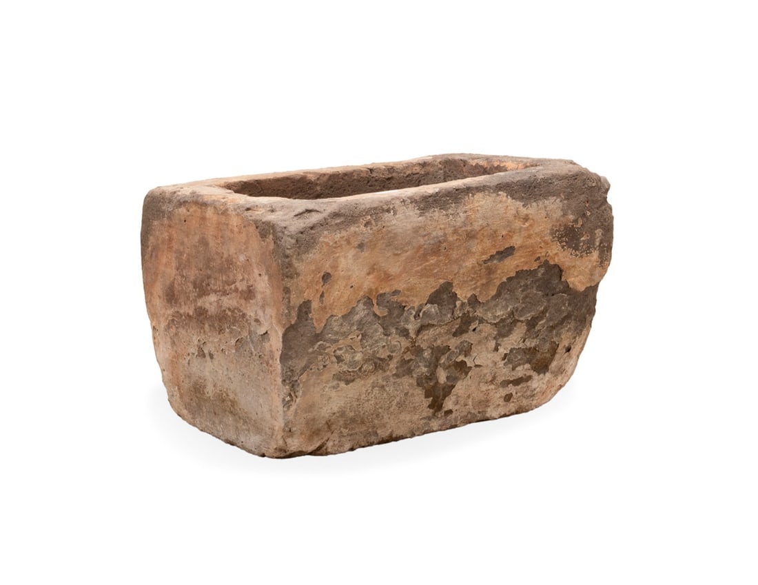 19TH/20TH C. EUROPEAN RECTANGULAR STONE TROUGH: European, 19th / 20th century. Provincial rectangular carved stone trough, now repurposed as a garden planter, apparently unmarked. Approximate dimensions: h. 17.5", w. 29", d. 20".