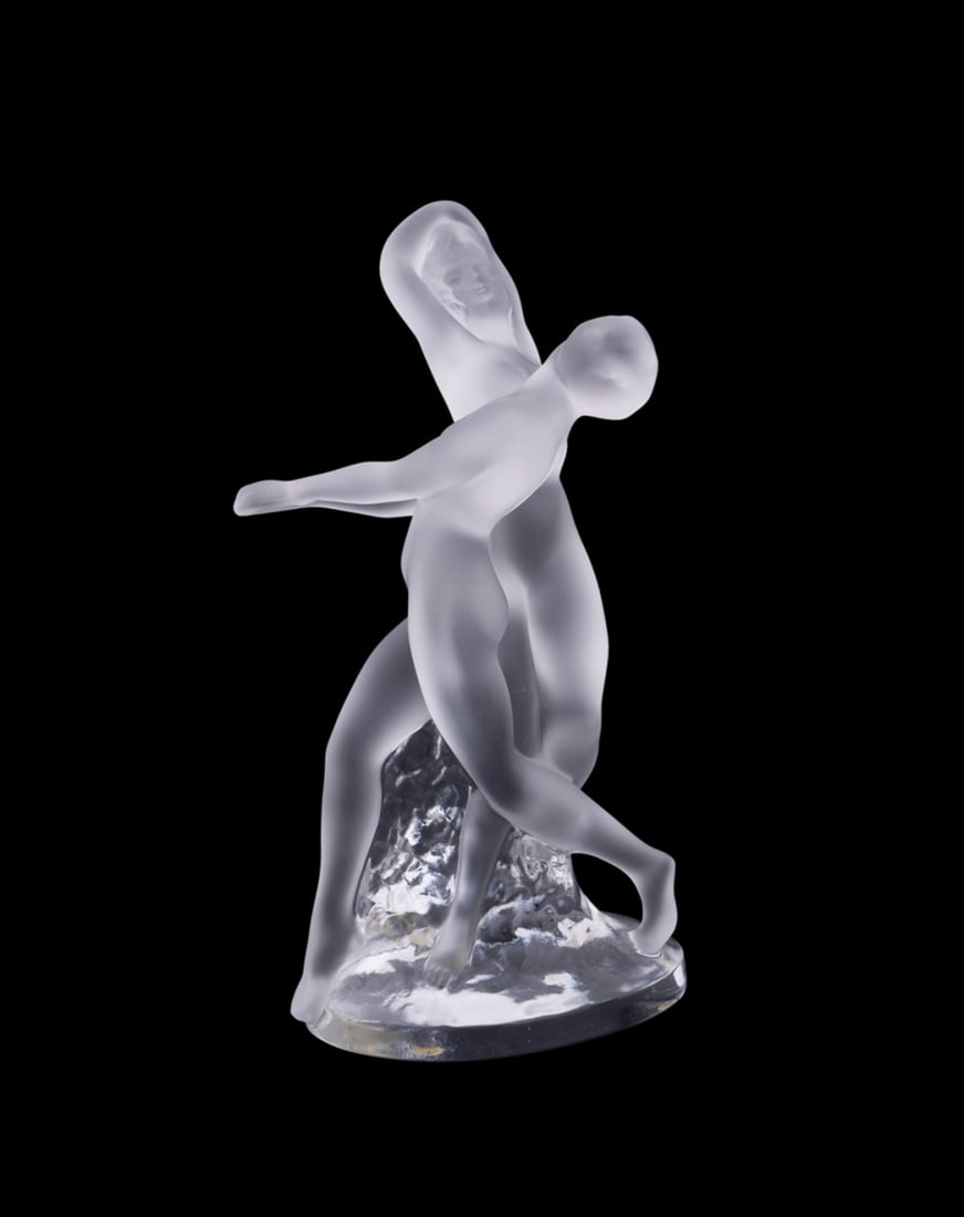 MARC LALIQUE FOR LALIQUE, 'DEUX DANSEUSES' FIGURE: Marc Lalique (French, 1900-1977) for Lalique (French, founded 1888), late 20th to early 21st century. Colorless partial frosted crystal "Deux Danseuses" figure, modeled as two dancers, appropriately m