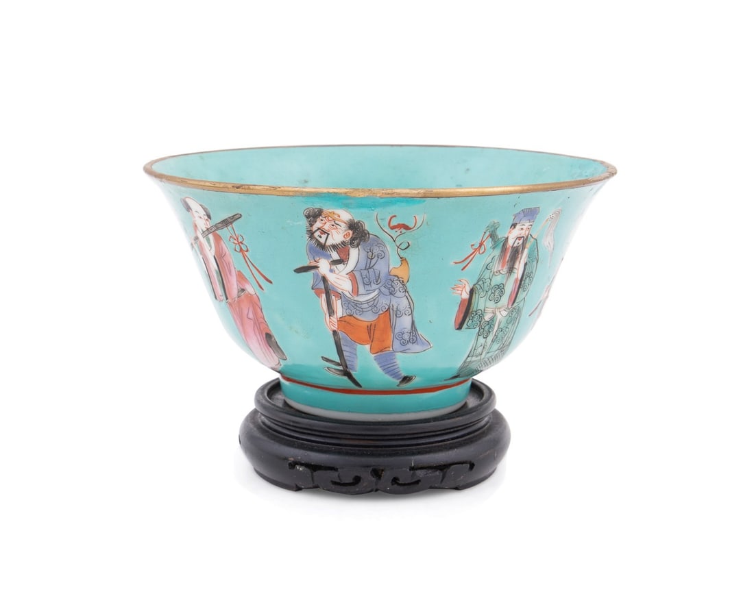 SMALL CHINESE FIGURAL TURQUOISE PORCELAIN BOWL: Chinese, late 19th century. Chinese porcelain bowl decorated with eight Chinese Immortals dressed in colorful apparel, turquoise glazed interior and exterior, gilt lip rim, seated upon modern wooden s