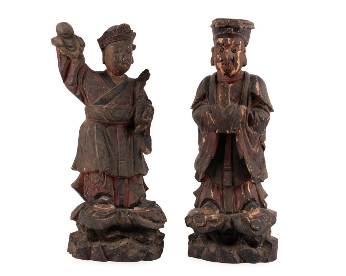 TWO CHINESE QING DYNASTY CARVED WOOD FIGURES: Chinese, late Qing Dynasty. Two polychrome carved wood figures depicting Daoist deities, each with hollow compartments in rear made for sacred relics, apparently unmarked. Provenance: Private Collecti
