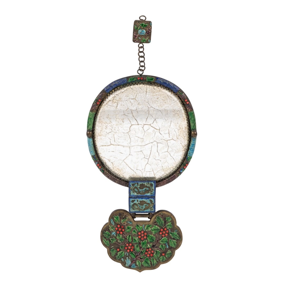 CHINESE OVAL SHAPED ENAMELED MIRROR: Chinese, early 20th century. Multi colored oval shaped mirror having enameled decorations, inlaid coral beads, with decorated hook at top and Ru-ri shield attached to base, fitted in bronze and silver