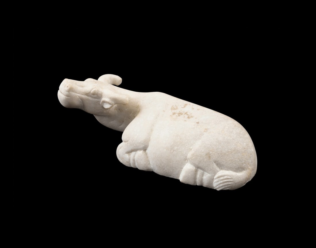 RECUMBENT WATER BUFFALO WHITE MARBLE SCULPTURE: Asian. Carved white marble recumbent water buffalo sculpture, apparently unmarked. Provenance: Private Collection of an Esteemed Gentleman, Atlanta, GA. Approximate dimensions: h. 4", w. 11.25", d. 4.