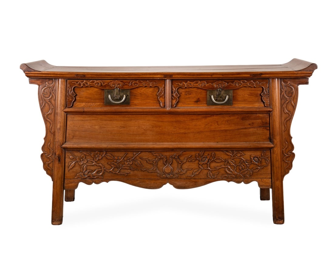 CHINESE HUANGHUALI LIANSANCHU OR ALTAR COFFER: Chinese, 19h century. Carved huanghuali hardwood altar table or coffer, also known as liansanchu, with 2-drawers and a central compartment, rectangular top with upturned ends or ice-plate edges,