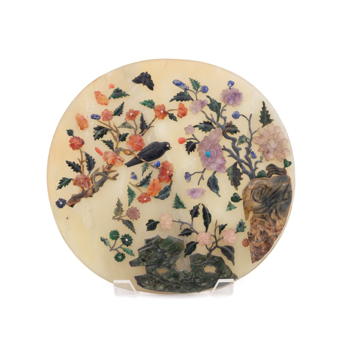 CHINESE JADE TABLE SCREEN ON HARDWOOD STAND: Chinese, mid 19th century. Table screen having large, round jade disc applied with multi-colored hardstone flowers and birds, atop a highly carved hardwood stand. Approximate dimensions: h. 21",
