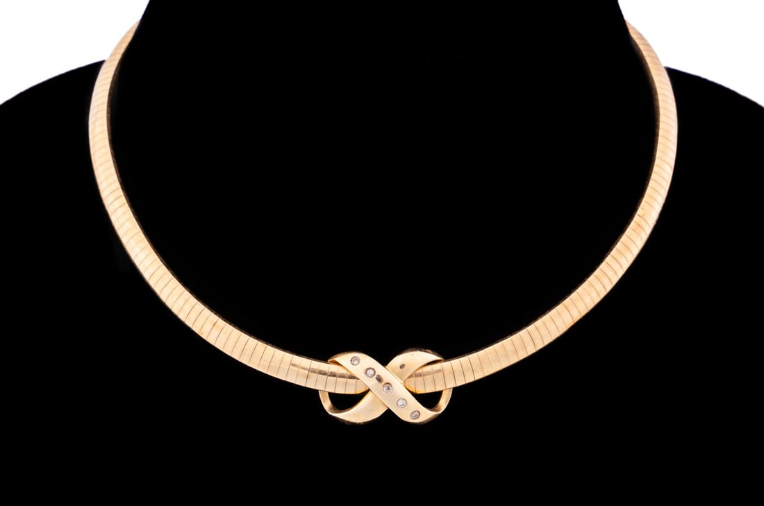 DIAMOND INFINITY 14K YG PENDANT & OMEGA CHAIN: Diamond infinity pendant enhancer on a cocoon omega necklace both in 14k yellow gold with (5) small round diamonds. Chain stamped Italy / 14k, pendant stamped 14k / 585. Approximate dimensions: chain